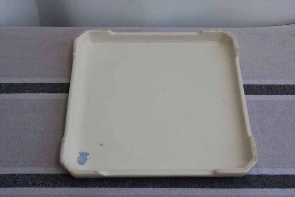 Ancien dessous de plat en céramique