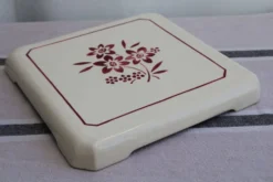 Ancien dessous de plat en céramique