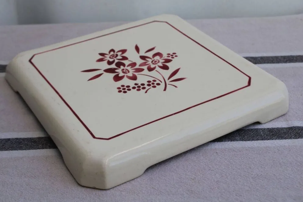 Ancien dessous de plat en céramique