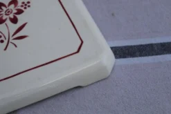Ancien dessous de plat en céramique