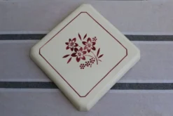 Ancien dessous de plat en céramique