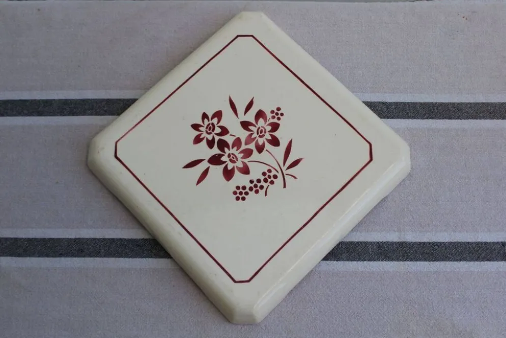 Ancien dessous de plat en céramique