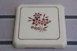 Ancien dessous de plat en céramique