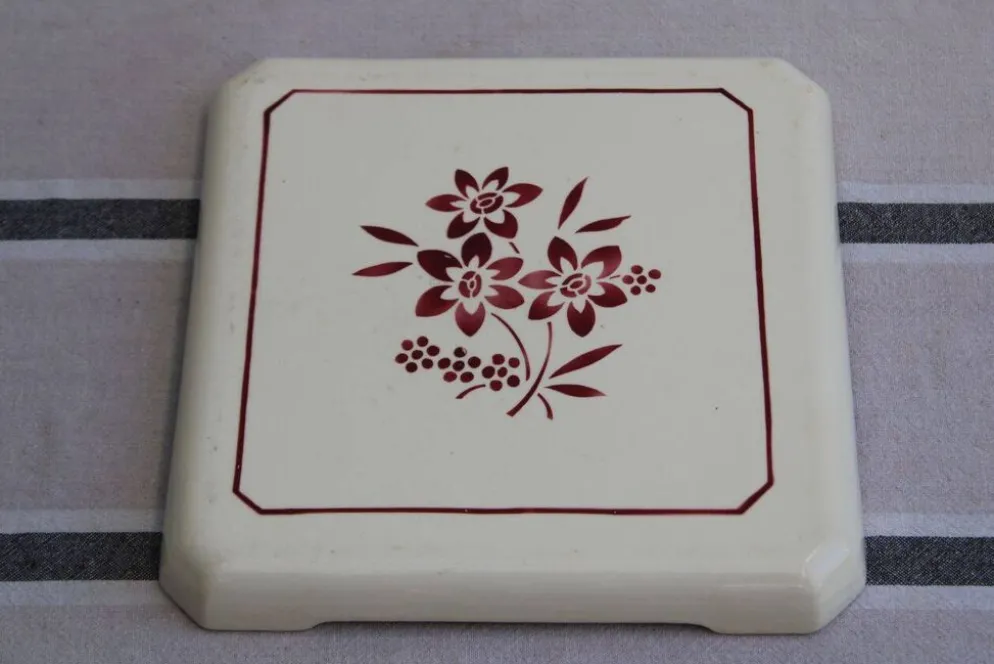 Ancien dessous de plat en céramique