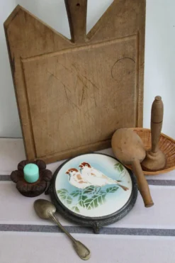 Ancien dessous de plat en céramique
