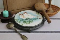 Ancien dessous de plat en céramique