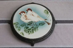 Ancien dessous de plat en céramique