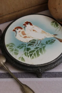 Ancien dessous de plat en céramique