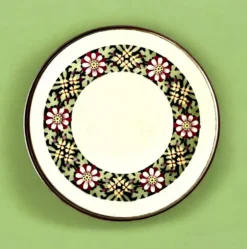 Ancien dessous de plat en céramique - décor floral
