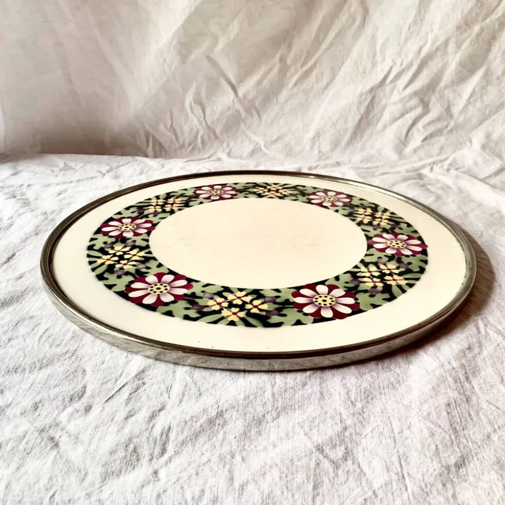 Ancien dessous de plat en céramique - décor floral