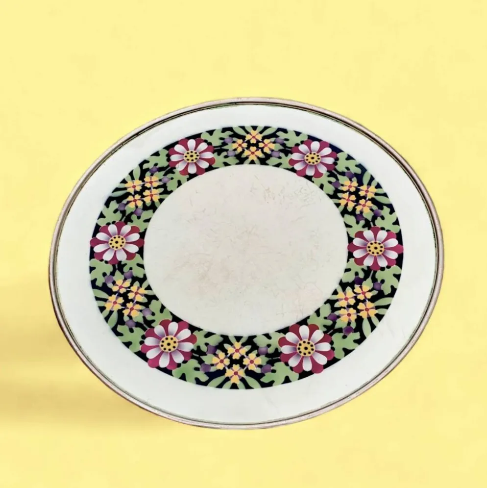 Ancien dessous de plat en céramique - décor floral