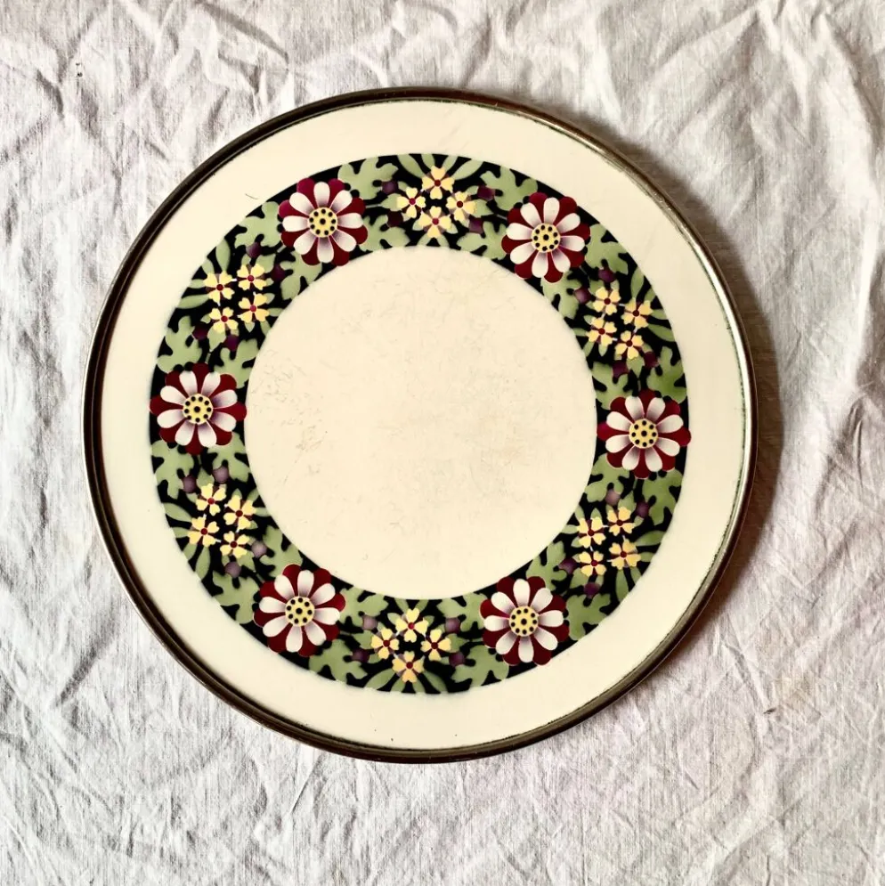 Ancien dessous de plat en céramique - décor floral