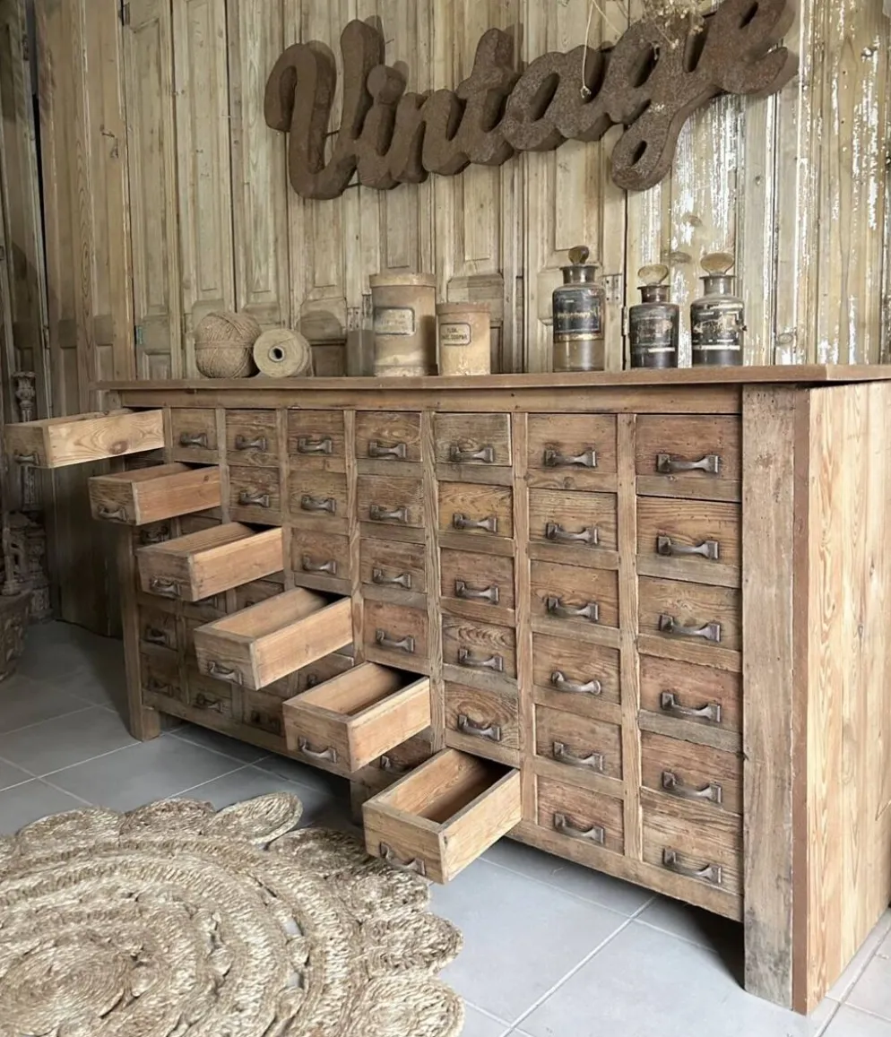 Ancien meuble de metier à multiples tiroirs