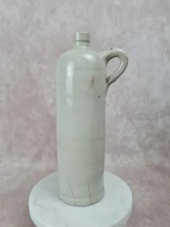 Ancienne bouteille en grès vernissé beige XIXe, avec anse, déco vintage