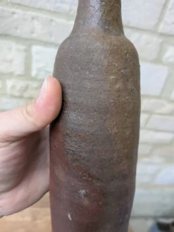 Ancienne bouteille en terre cuite faite main