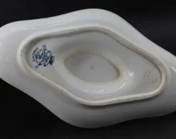 Ancienne saucière en faïence Longwy