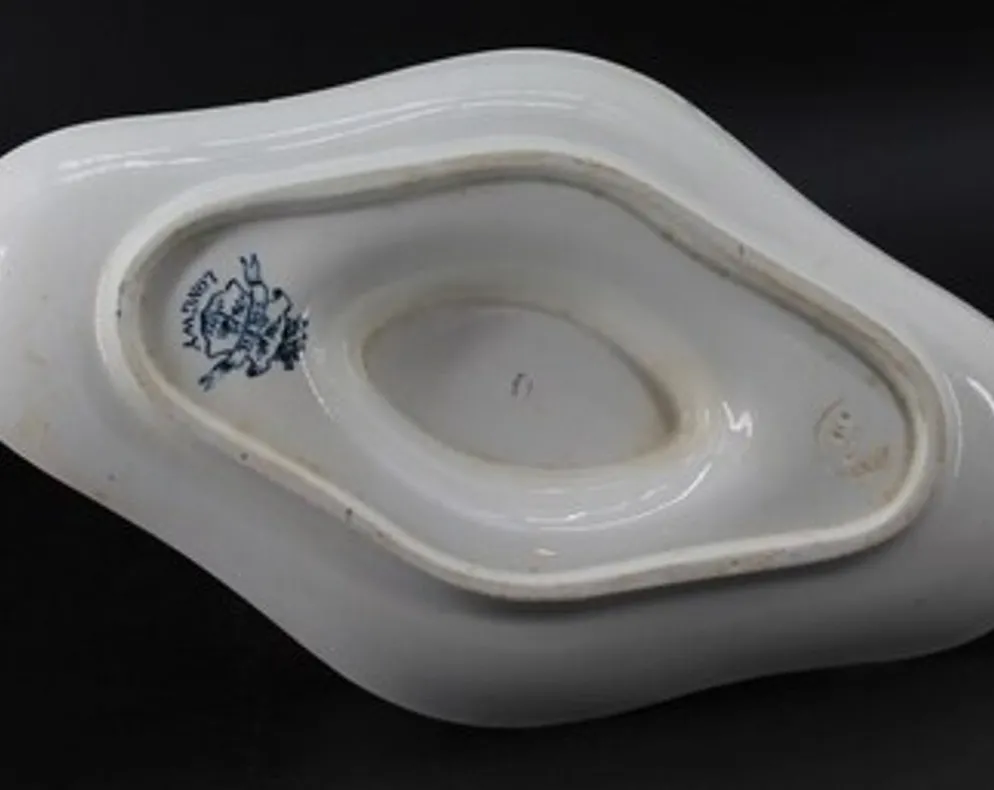 Ancienne saucière en faïence Longwy