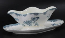 Ancienne saucière en faïence Longwy