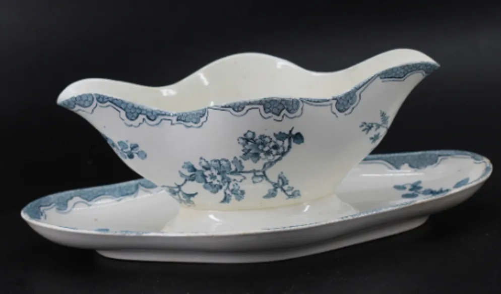 Ancienne saucière en faïence Longwy