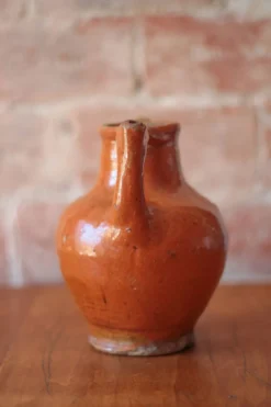 Ancien Pichet Orjol en terre cuite émaillé orange Sud Ouest France XIXe