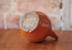 Ancien Pichet Orjol en terre cuite émaillé orange Sud Ouest France XIXe