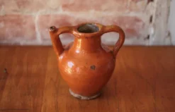 Ancien Pichet Orjol en terre cuite émaillé orange Sud Ouest France XIXe