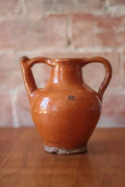 Ancien Pichet Orjol en terre cuite émaillé orange Sud Ouest France XIXe