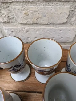 Ancien service à café avec 6 mazagrans et cafetière décor floral bleu