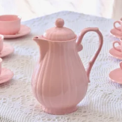 Ancien service à café de Salins-les-Bains en faïence rose