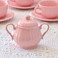Ancien service à café de Salins-les-Bains en faïence rose