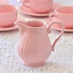 Ancien service à café de Salins-les-Bains en faïence rose