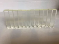 12 anciens porte-couteaux en lucite