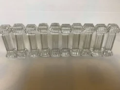 10 anciens porte-couteaux en verre moulé