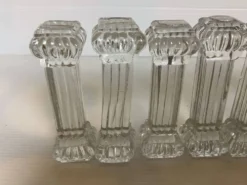 10 anciens porte-couteaux en verre moulé