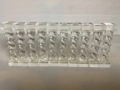 10 anciens porte-couteaux torsadés en lucite
