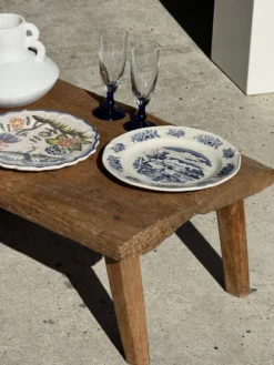 Assiette ancienne en faïence à décor de paysage bleu D24,5