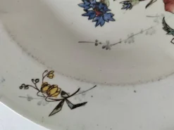 Assiette creuse Terre de Fer HB & Cie décor fleurs des champs 1900-1910