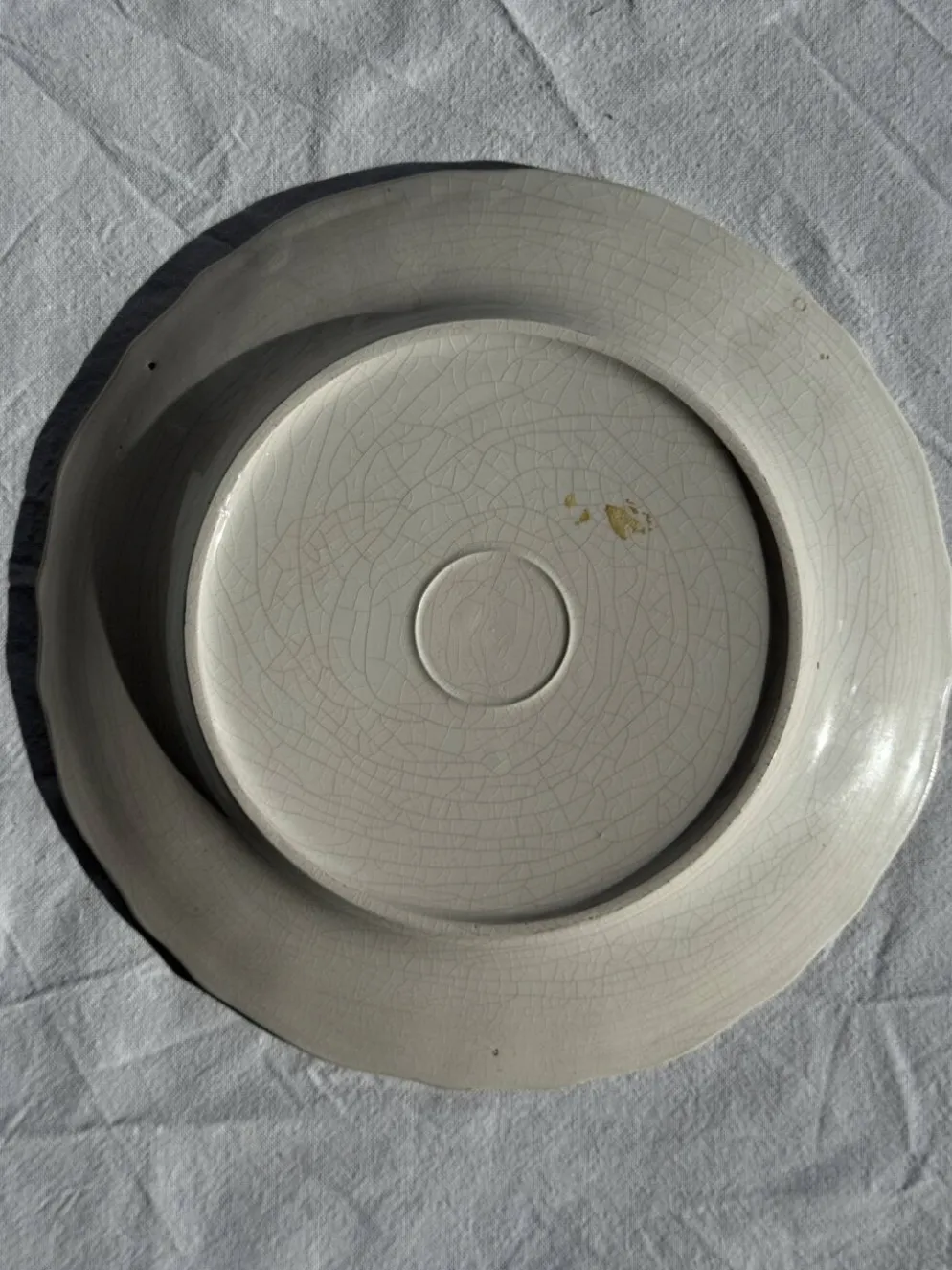 Assiette décorative à motif d'oiseau stylisé D24,5