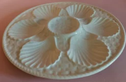Assiette à huîtres en faïence blanche de Longchamp