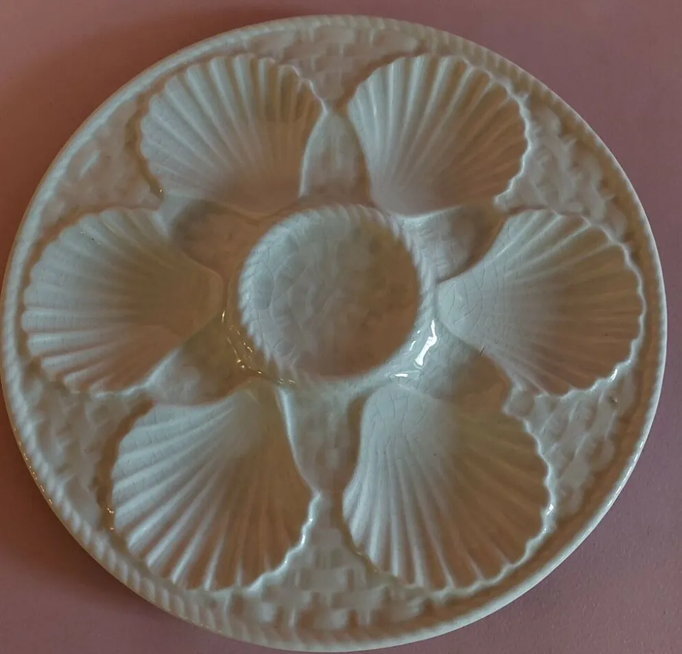 Assiette à huîtres en faïence blanche de Longchamp