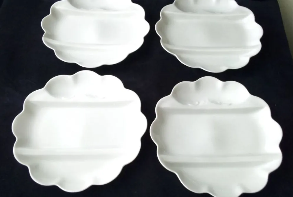 4 Assiettes à asperges en porcelaine de Limoges