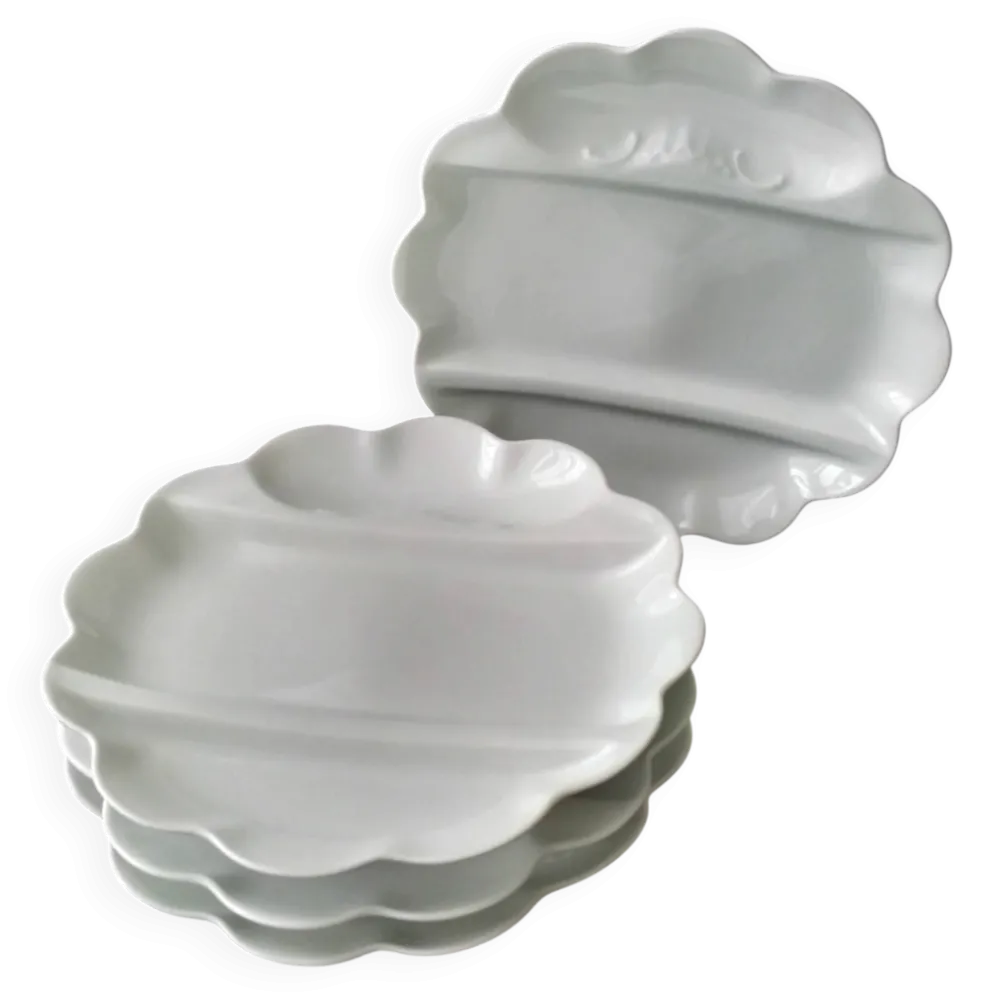 4 Assiettes à asperges en porcelaine de Limoges