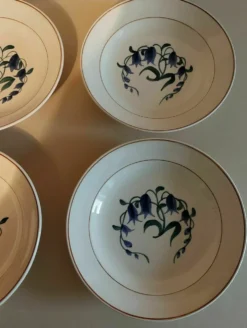 Assiettes creuses série de six faïence de Longchamp décor Simone