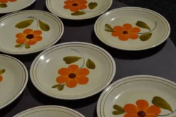 11 assiettes à dessert "fleur" vintage