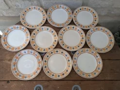 10 assiettes à dessert Saint Amand Amandinoise frise fleurs orange et noire
