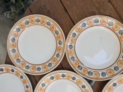 10 assiettes à dessert Saint Amand Amandinoise frise fleurs orange et noire