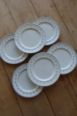 6 assiettes à dessert vintage estampillées Longchamp liseré fleuri