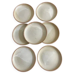 7 assiettes en grés 1970