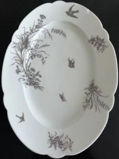 8 assiettes en porcelaine et 1 plat CH Pillivuyt & Cie