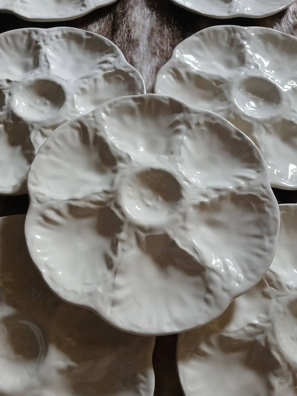 7 assiettes à huitres anciennes Gien